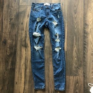Mid-rise distressed Skinny Jeans (The Garage)